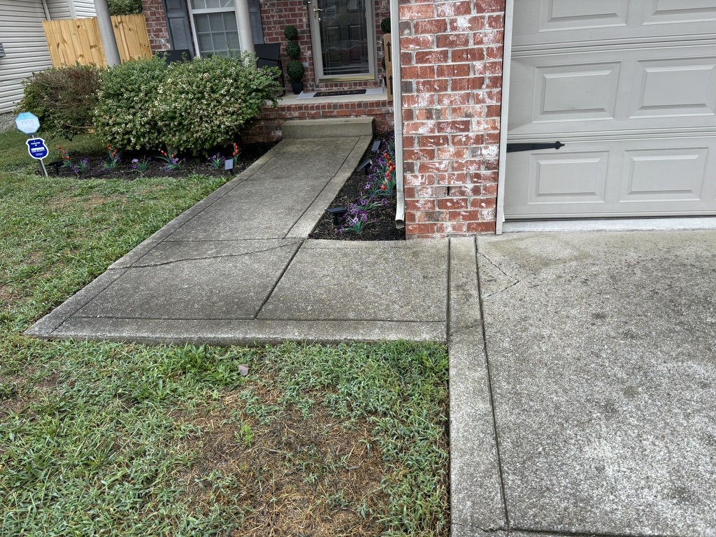 After - Driveway and sidewalk pressure washing in Hermitage TN removing years of dirt and grime
