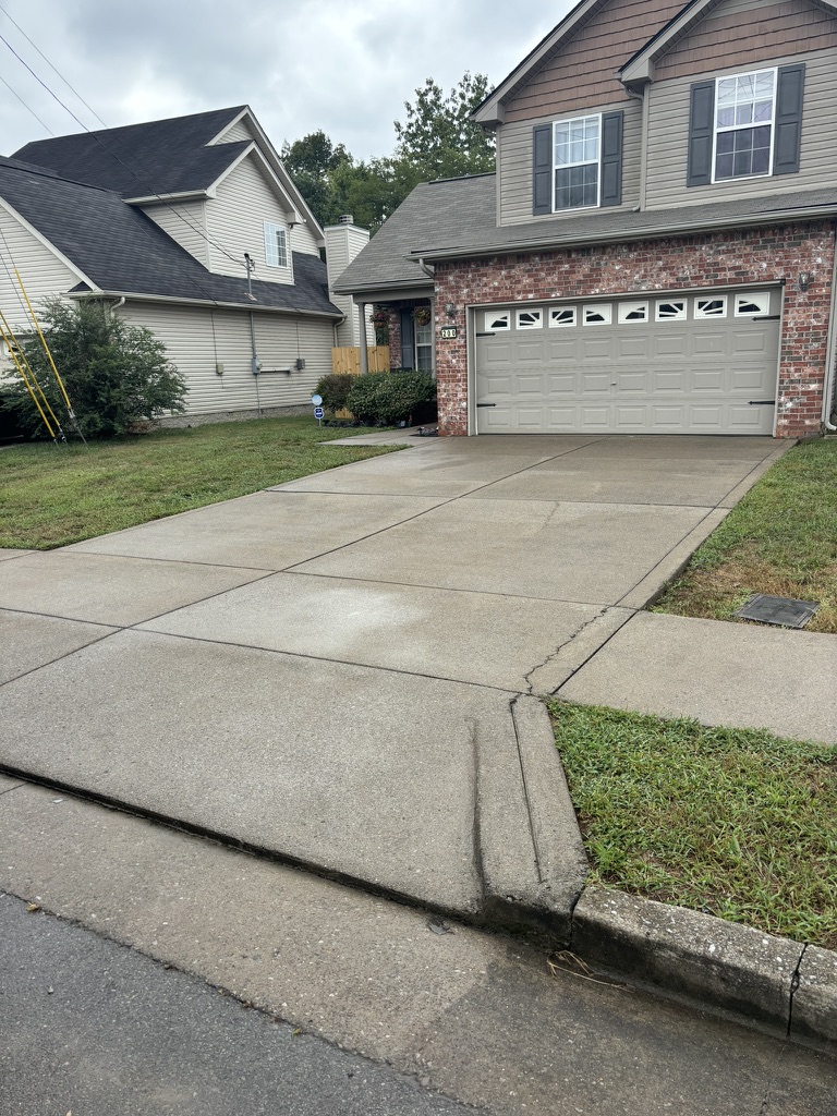 Before - Driveway and sidewalk pressure washing in Hermitage TN removing years of dirt and grime