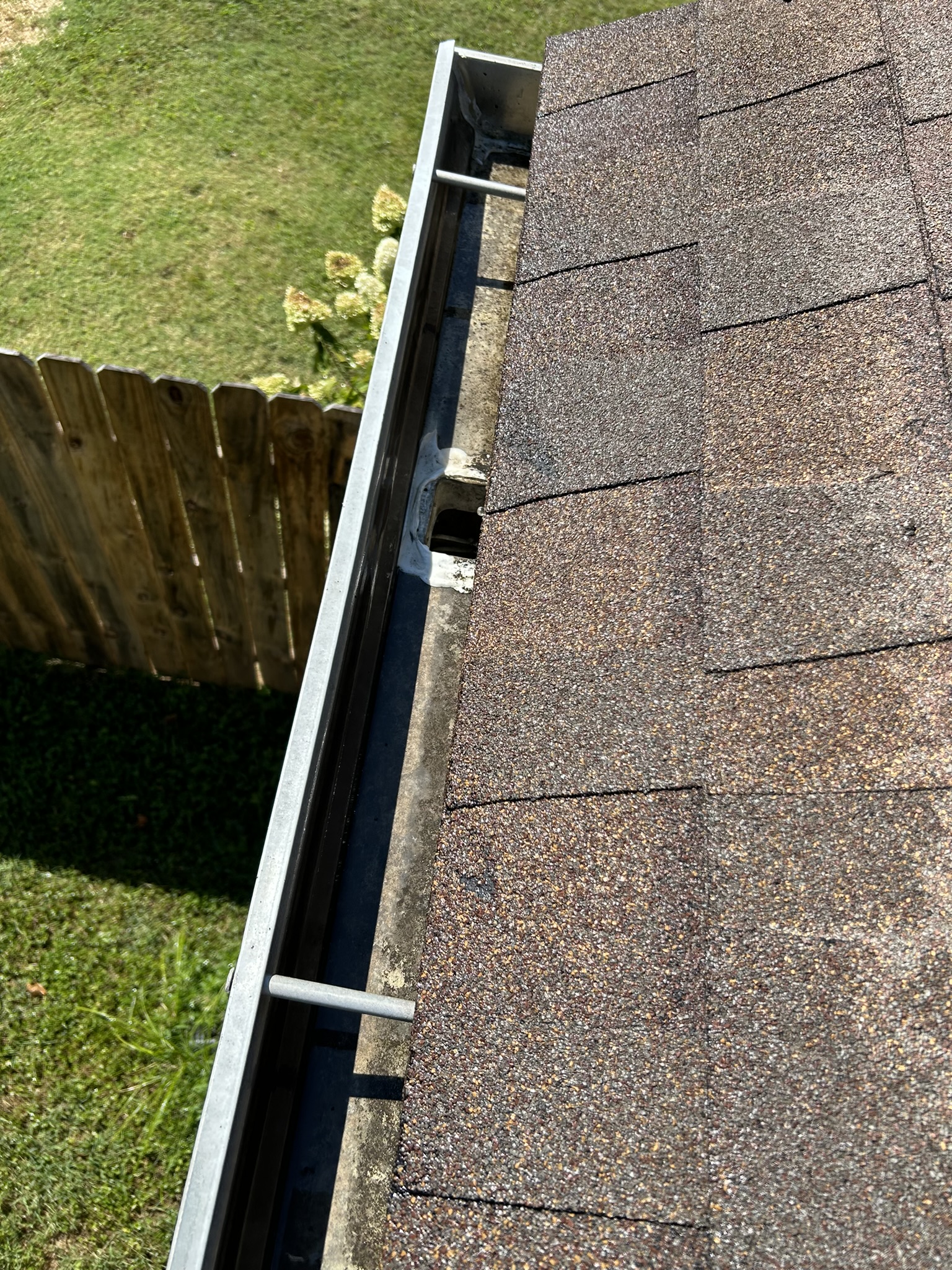 Before - Before and after gutter cleaning Nashville TN - removing debris and leaves from clogged gutters