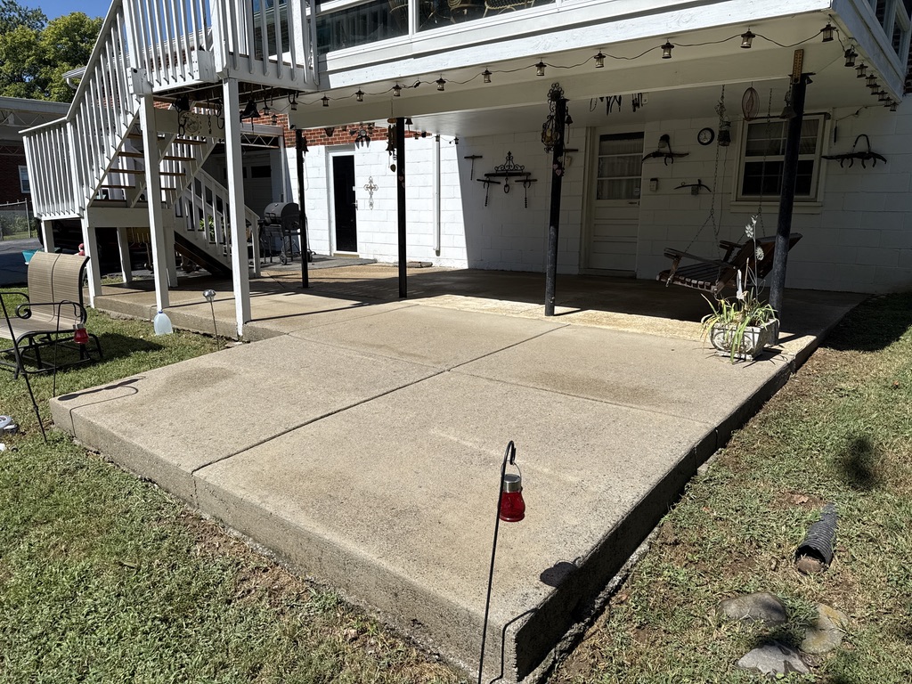 Before - Before and after concrete patio cleaning in Nashville TN showing dramatic results