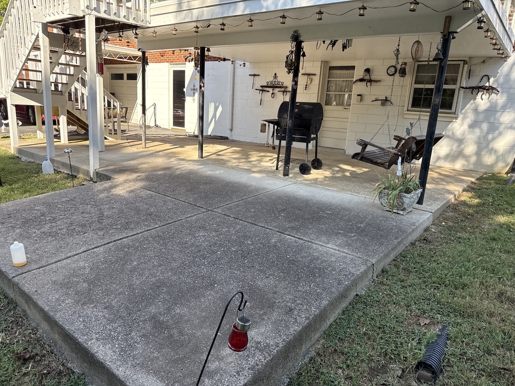 After - Before and after concrete patio cleaning in Nashville TN showing dramatic results