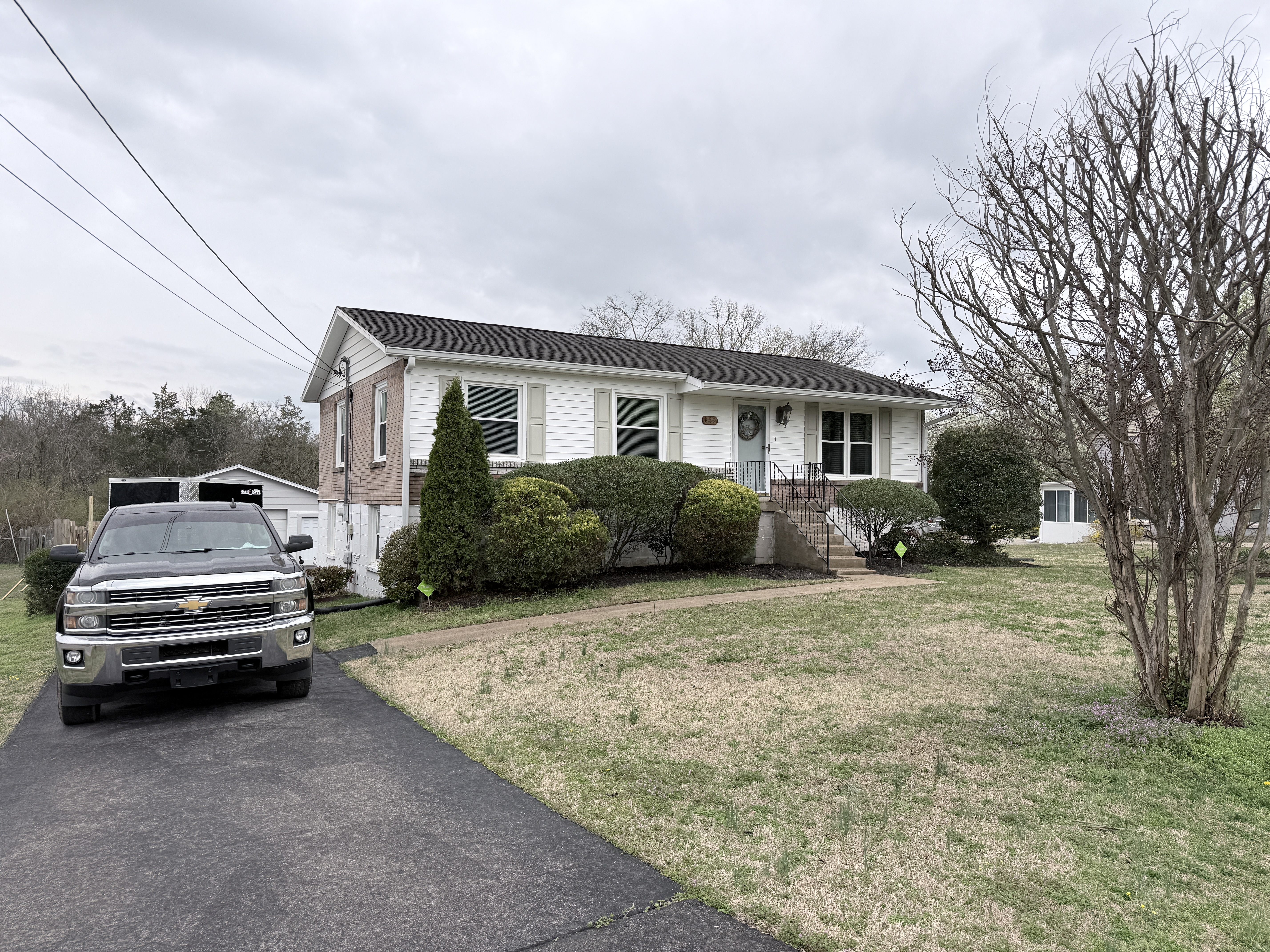 After - House washing in Nashville TN removing dirt and algae from vinyl siding